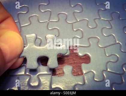 Last piece of the puzzle Stock Photo