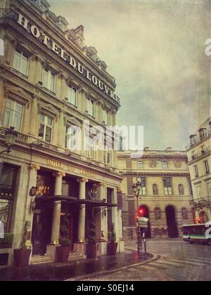 View of Hotel du Louvre, a Hyatt 5 star hotel located in the historic centre of Paris, France. Antique, retro look with vintage paper texture overlay.
