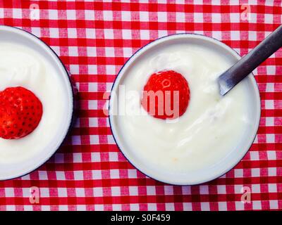 Greek natural yogurt topped with fresh strawberry's Stock Photo