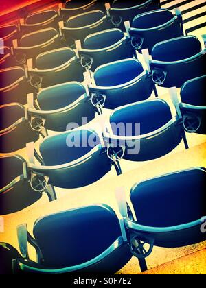Bright blue stadium seating Stock Photo