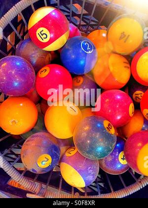 Basket of vintage Billiard  balls in antique store Stock Photo