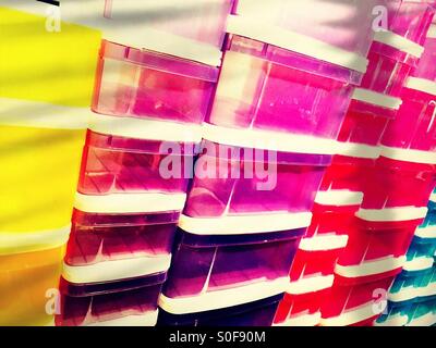 Colorful plastic storage bins with drawers at The Container Store NYC Stock Photo