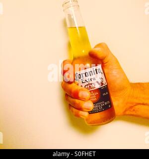 Drink in hand Stock Photo