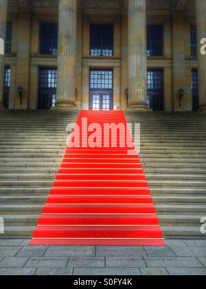 Red carpet on the stairs Stock Photo