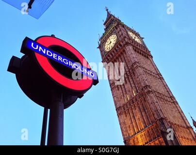 View of Big Ben and a London Underground sign outside Westminster tube station, Parliament Square, Westminster, London, England, UK. Stock Photo