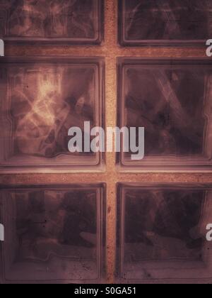Window made from glass blocks making abstract pattern Stock Photo