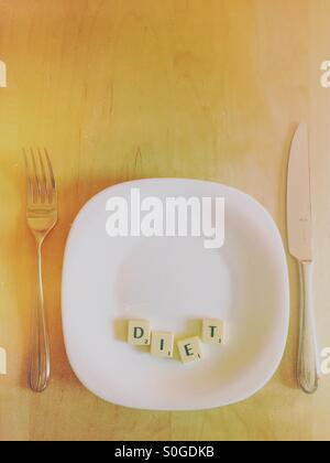 Plate with the word DIET in scrabble letters Stock Photo