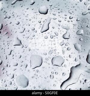 Water droplets on the Metal Surface of a Stainless Steel Kitchen Sink Stock Photo