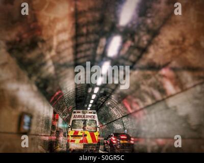 Ambulance in the Blackwall Tunnel, South East London, England, United Kingdom, Europe Stock Photo