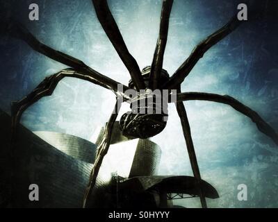 Detail of Spider sculpture and the Guggenheim Museum in Bilbao, Spain Stock Photo