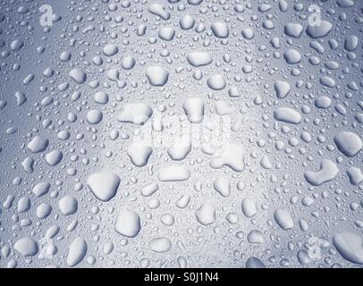 Water droplets on metallic car paint Stock Photo