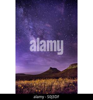 The Milky Way rising over the mountains above Las Cruces' West Mesa Stock Photo