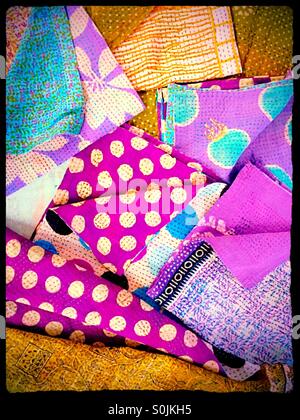 Still life close-up of multi colored fabrics. Stock Photo