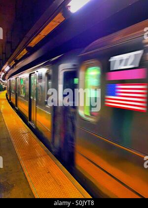Six subway train arrives at Astor Place station, New York City. Stock Photo