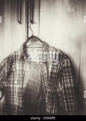 Shirt and jeans on a clothes hanger Stock Photo