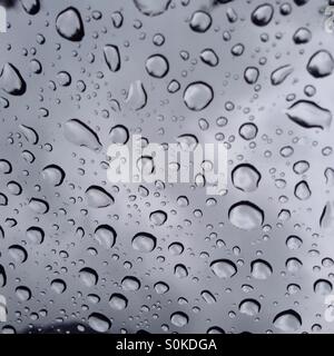 Water droplets on window Stock Photo