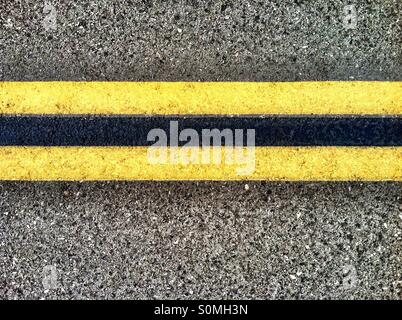 Double yellow lines on Highway Stock Photo