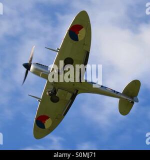 World War Two British Spitfire fighter aircraft with its landing gear down. Stock Photo