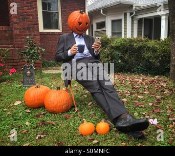 Jack Pumpkinhead, man wearing a mask. Jack o lantern. Stock Photo