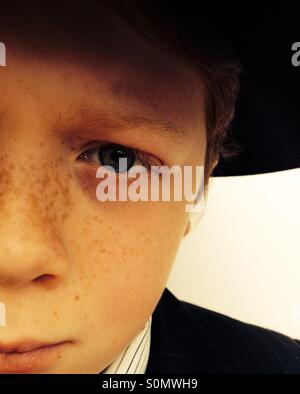 Red haired boy with freckles Stock Photo