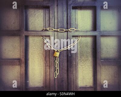 Gate locked with a chain Stock Photo