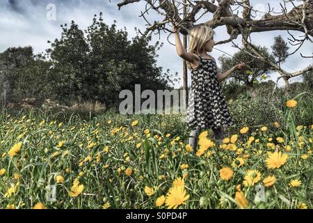 Girl in a field Stock Photo