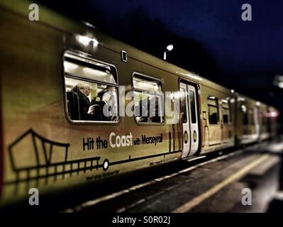 Mereyrail train arriving at Maghull Station Stock Photo