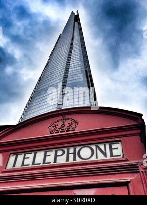 Iconic London images: Shard and traditional phone box. Stock Photo