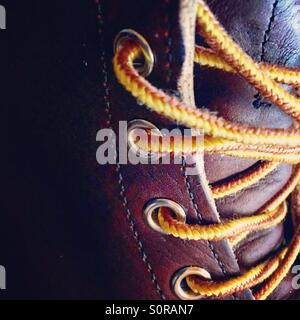 Close-up of laces on a brown leather boot. Stock Photo