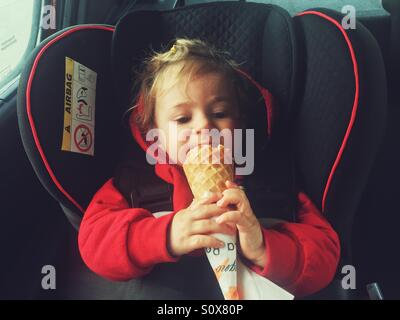 one year old baby eating ice cream Stock Photo