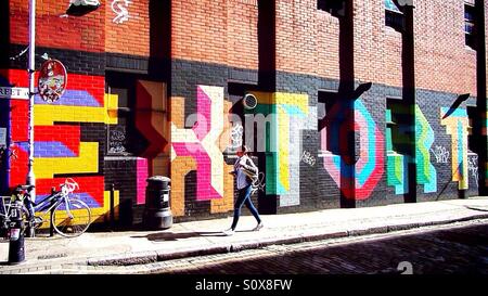 A colorful graffiti in Shoreditch, London. Stock Photo