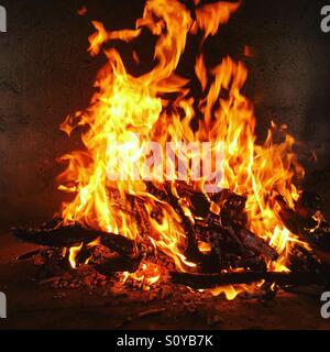 Fire burning in fireplace Stock Photo