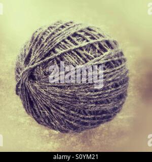 Ball of grey yarn Stock Photo