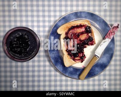 Blueberry jam on toast Stock Photo