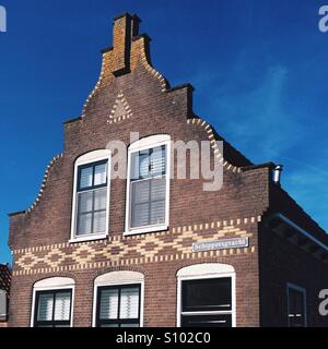 Dutch brick building in the small town of Volendam, North Holland, Netherlands Stock Photo