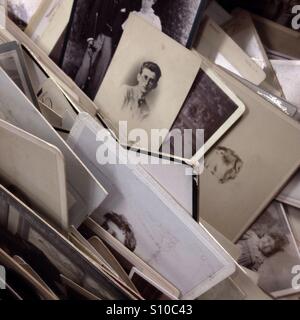 Box of assorted old black and white photographs Stock Photo