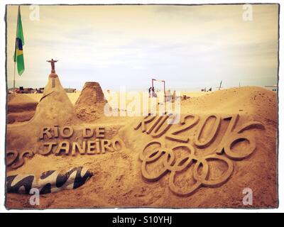 Olympic Games themed sand castle on Copacabana beach, Rio de Janeiro Stock Photo