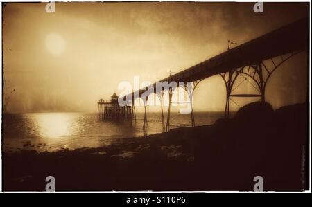 An Antique Effect Monochrome Image of Clevedon Pier, North Somerset, England. This Grade One Listed Pier was constructed in the 1860's and used by Paddle Steamers visiting from South Wales & Devon. CH Stock Photo