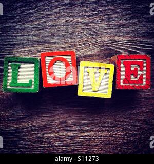 Word LOVE done with alphabet wood blocks letters Stock Photo