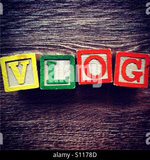 Word VLOG done with wood block alphabet letters Stock Photo