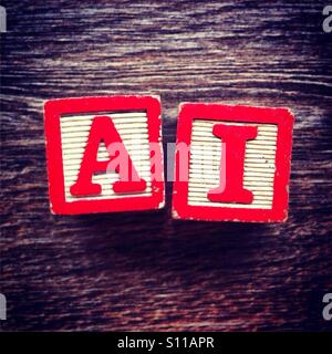 Acronym A.I. meaning Artificial Intelligence done with alphabet wood blocks letters Stock Photo