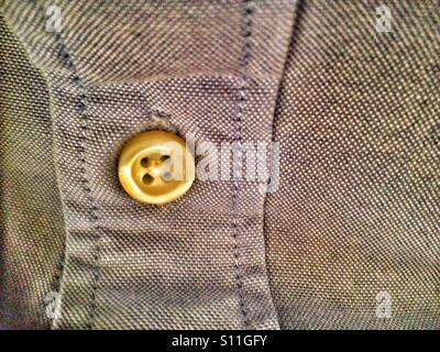 A button on a shirt. Stock Photo