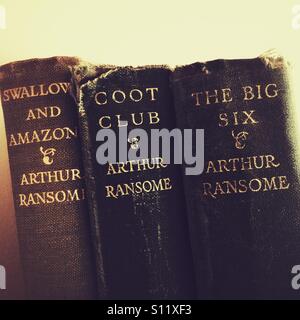 Old first edition worn Arthur Ransome books Stock Photo