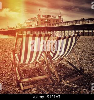 Deckchairs on brighton beach Stock Photo