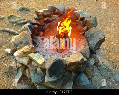 Rock Fire Pit Campfire With Flames Stock Photo