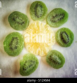 Candied kiwi fruit and pineapple Stock Photo