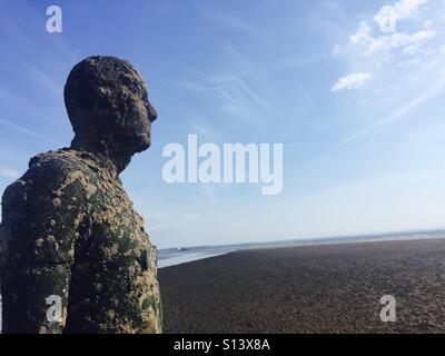 Another Place by Anthony Gormley at Crosby beach Stock Photo