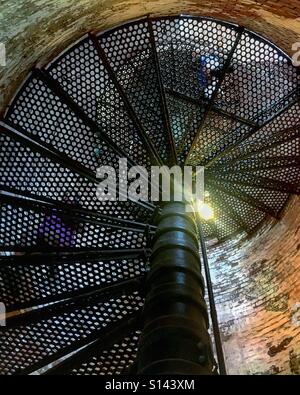 Walking up spiral staircase in the Fire Island lighthouse. Stock Photo