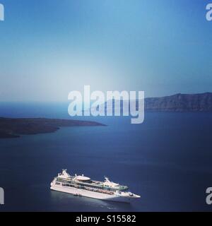 A cruise ship in the Caldera off Thira, Santorini, Greece Stock Photo