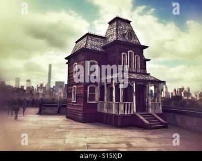 Cornelia Parker Transitional Object (PsychoBarn) a prop house installed on the roof of the Met museum. New York City, United States of America. Stock Photo